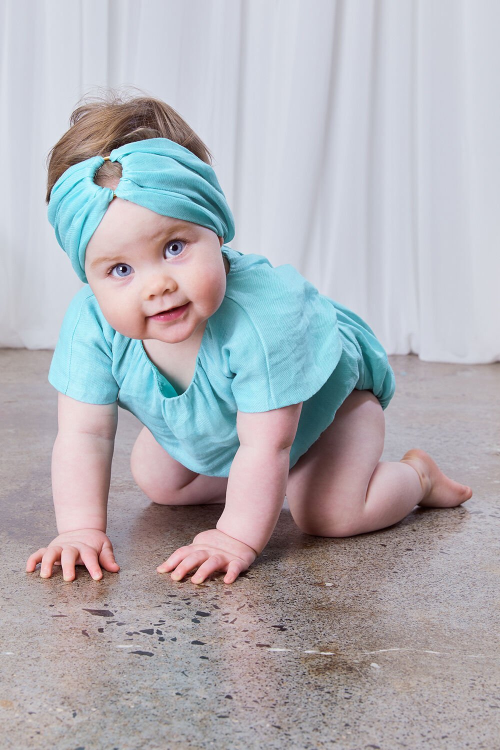 BABY GIRL ALESSA SMOCK GROW in colour CLEARWATER