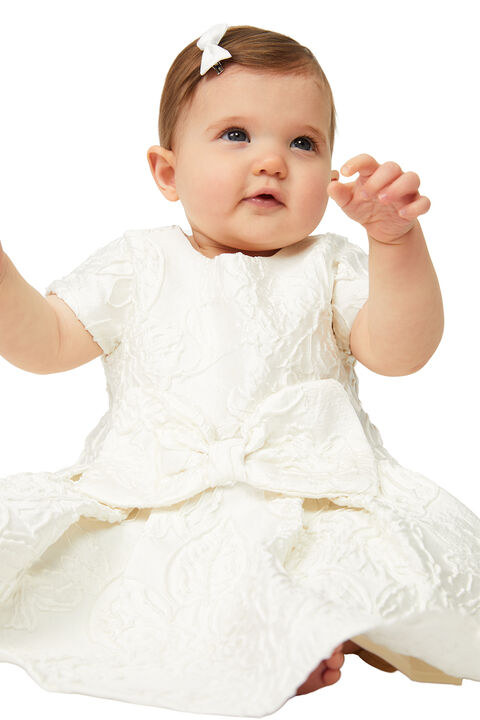 BABY GIRL MIRELA MINI BOW DRESS in colour CLOUD DANCER